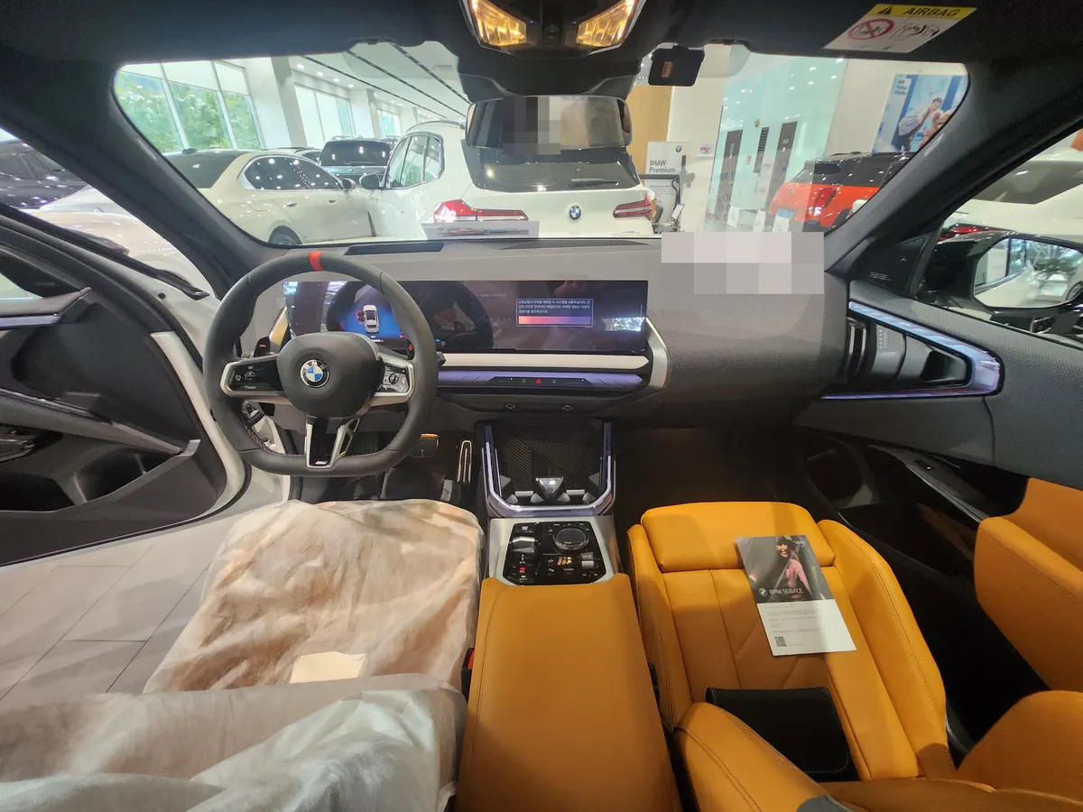 BMW X3 M50 xDrive 프로 운전석과 대시보드 — 제공 원본 차량 사진